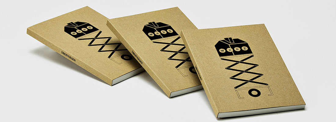 Softcoverbücher mit Umschlag aus Kraftkarton